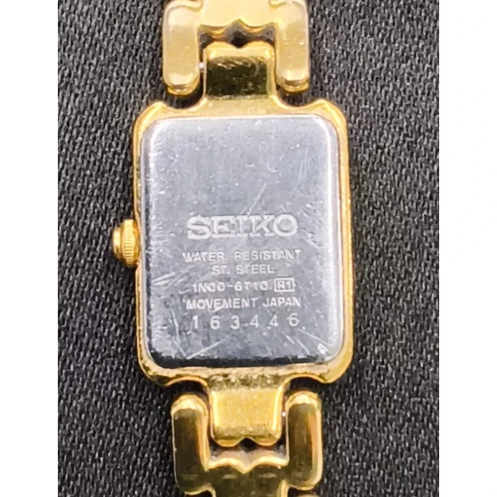 Vintage Seiko 1N00-6T10 Women's Watch Rectangle Gold Tone White Face #W5165